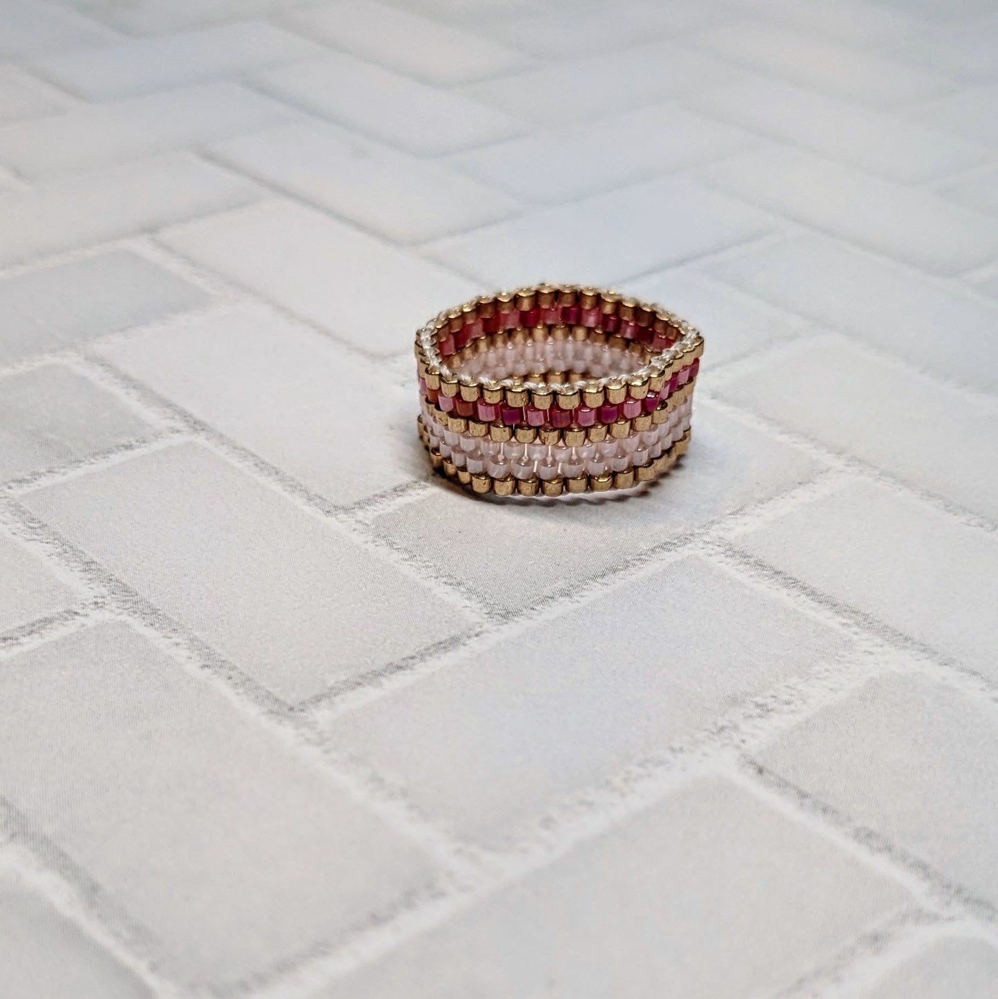 Pink, Gold, and Red Striped Woven Ring